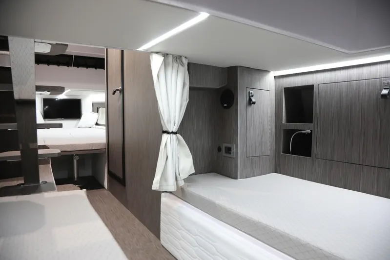  Yacht Photos Pics Luxurious interior of 2026 Ranieri CAYMAN 45.0 Cruiser with modern design and comfortable bedding.