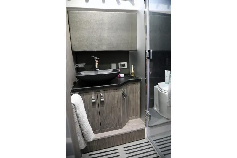  Yacht Photos Pics Modern bathroom interior of 2026 Ranieri CAYMAN 45.0 Cruiser with sleek fixtures.