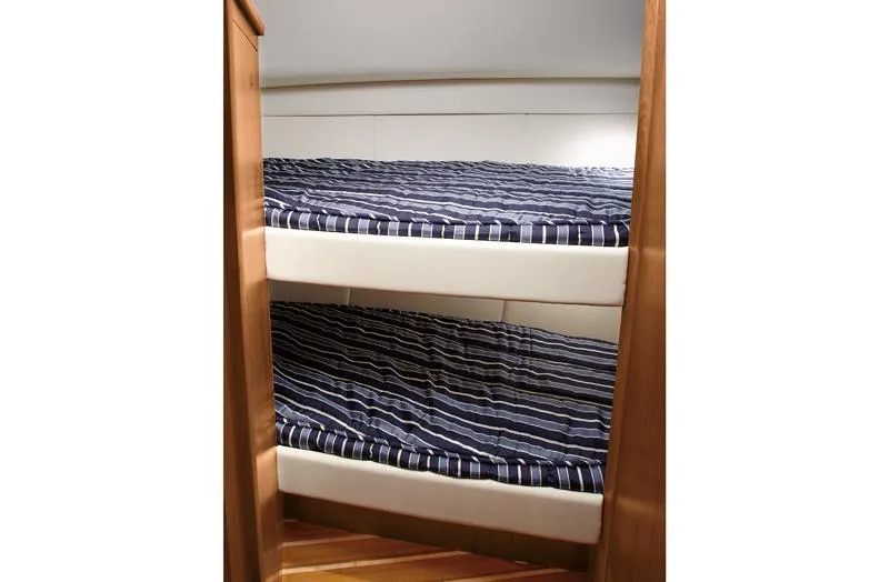 Fifth Case Yacht Photos Pics Manufacturer Provided Image: Bunk beds in the 2016 Tiara Yachts 4300 Open cabin.