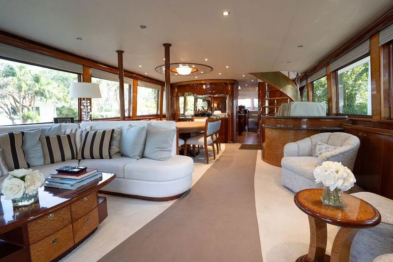  Yacht Photos Pics Luxurious interior of 2004 Cheoy Lee 84 Bravo Flybridge yacht with elegant seating and decor.