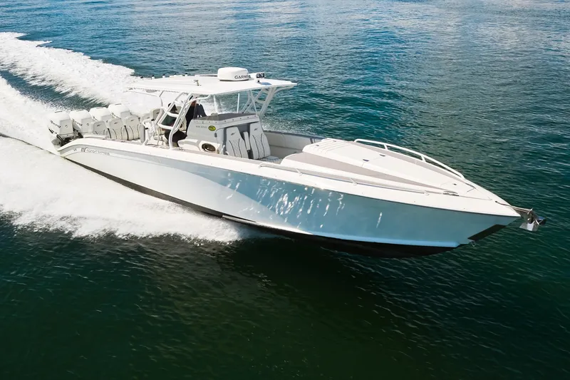  Yacht Photos Pics 2007 Midnight Express Cuddy boat cruising on open water, showcasing sleek design and powerful engines.