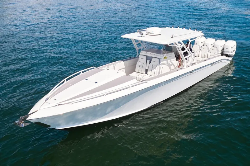  Yacht Photos Pics 2007 Midnight Express Cuddy boat on open water, featuring sleek design and multiple engines.