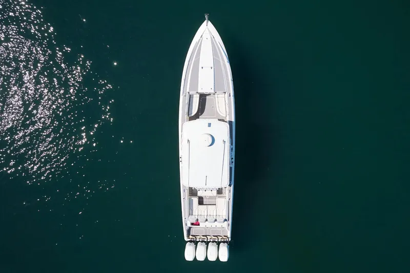  Yacht Photos Pics Aerial view of 2007 Midnight Express Cuddy boat on calm water.