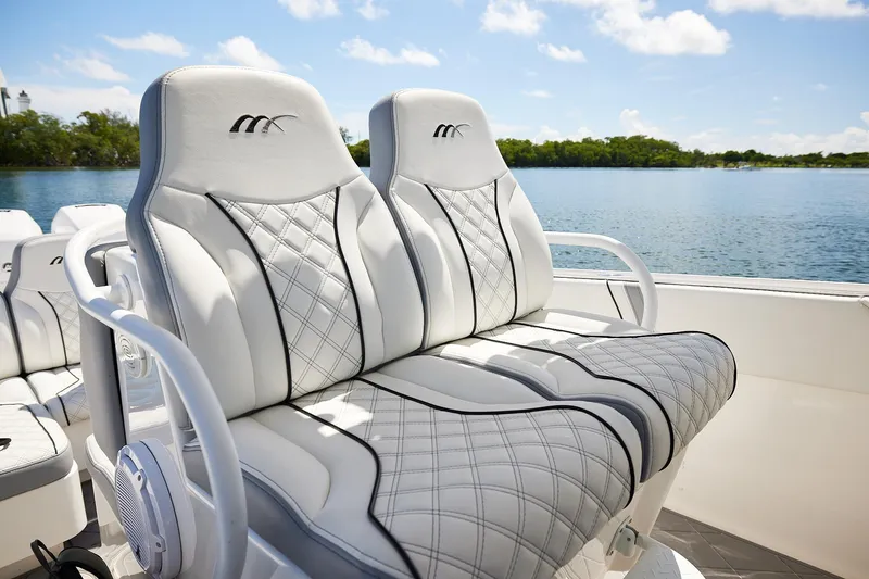  Yacht Photos Pics Luxurious seating on a 2007 Midnight Express Cuddy boat, with scenic water view.