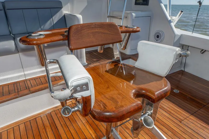 Stay Salty Yacht Photos Pics Luxury fishing chair on 2009 Viking 50 Convertible yacht with teak deck.