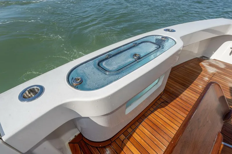 Stay Salty Yacht Photos Pics Livewell on 2009 Viking 50 Convertible yacht with teak deck and ocean view.