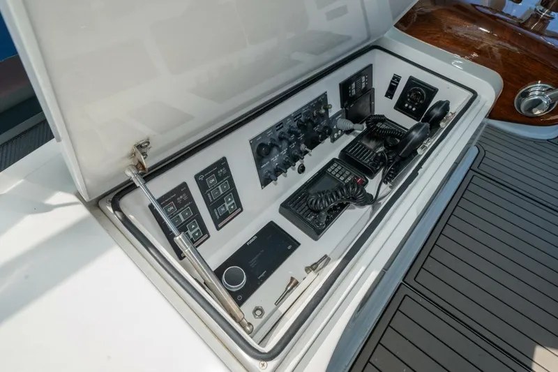 Stay Salty Yacht Photos Pics Control panel of a 2009 Viking 50 Convertible yacht with communication equipment.