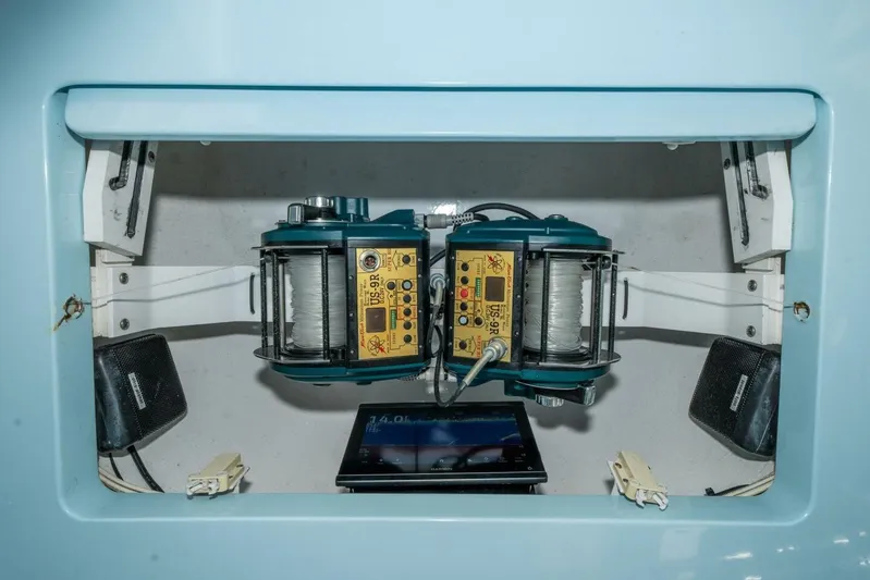 Stay Salty Yacht Photos Pics 2009 Viking 50 Convertible fishing equipment with dual electric reels and control panel.