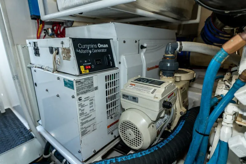 Stay Salty Yacht Photos Pics Cummins Onan marine generator in 2009 Viking 50 Convertible engine room.