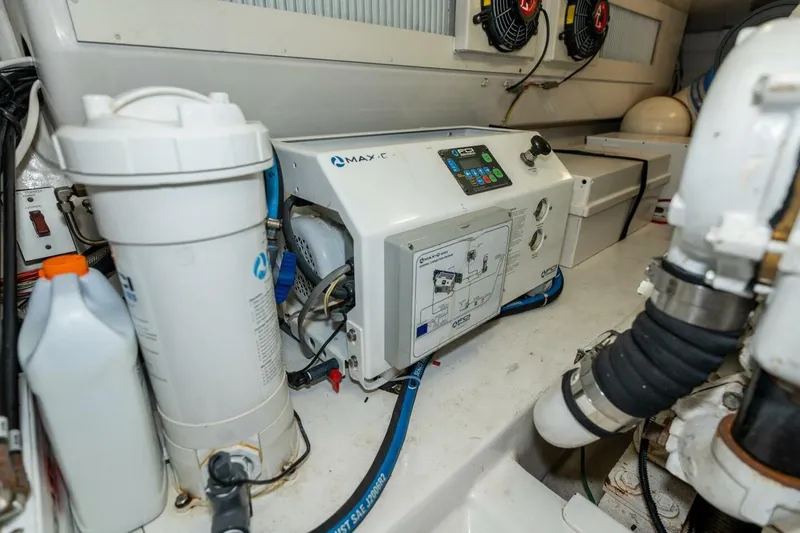Stay Salty Yacht Photos Pics Engine room of 2009 Viking 50 Convertible yacht with water filtration system.