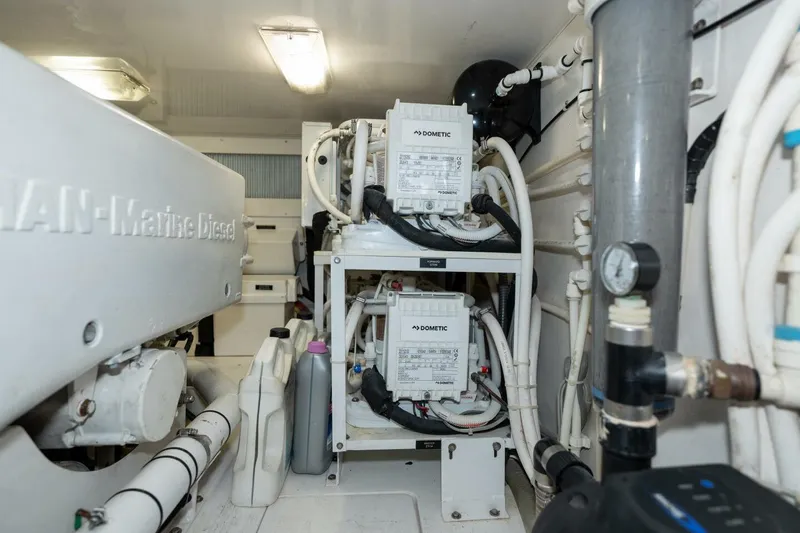 Stay Salty Yacht Photos Pics Engine room of 2009 Viking 50 Convertible yacht with Dometic equipment and MAN Marine Diesel.