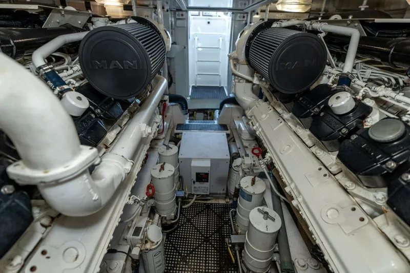 Stay Salty Yacht Photos Pics Engine room of 2009 Viking 50 Convertible yacht with MAN engines.