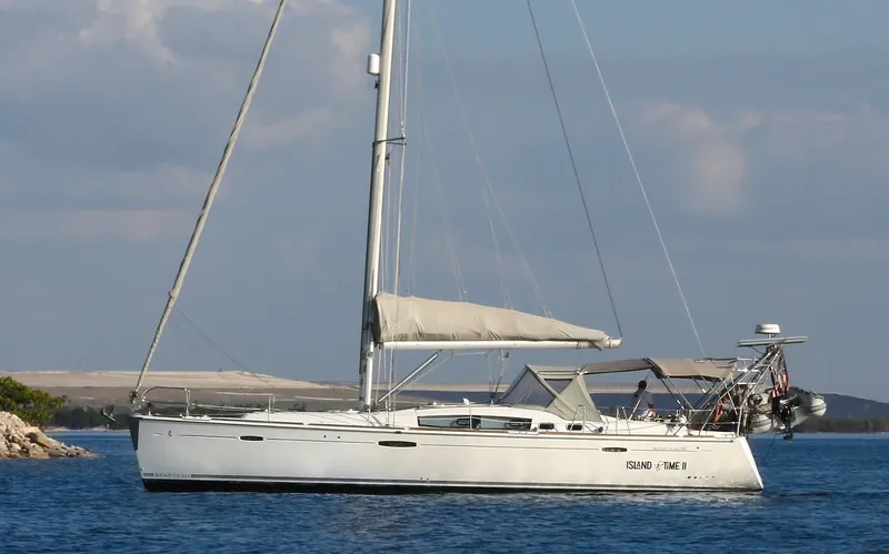 Island Time Ll Yacht Photos Pics 2008 Beneteau 46 sailboat on calm water, side view.