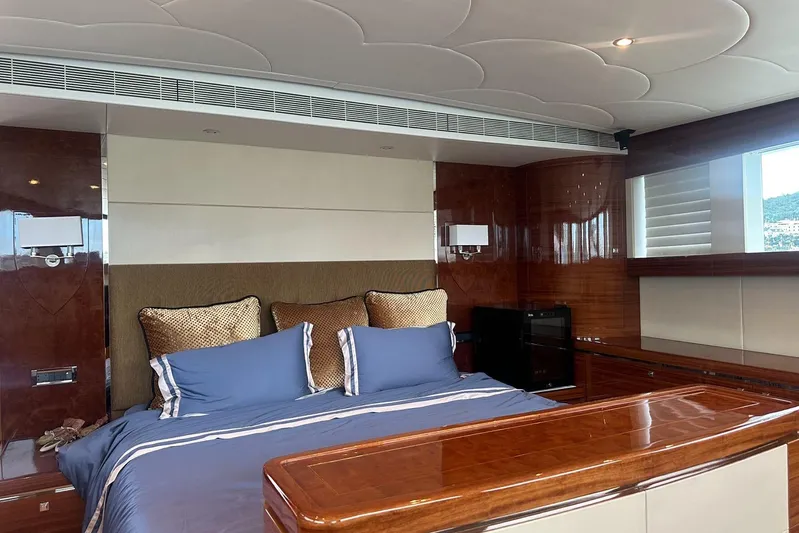  Yacht Photos Pics Luxurious bedroom interior on 2011 Horizon 110 yacht with elegant wood finishes.