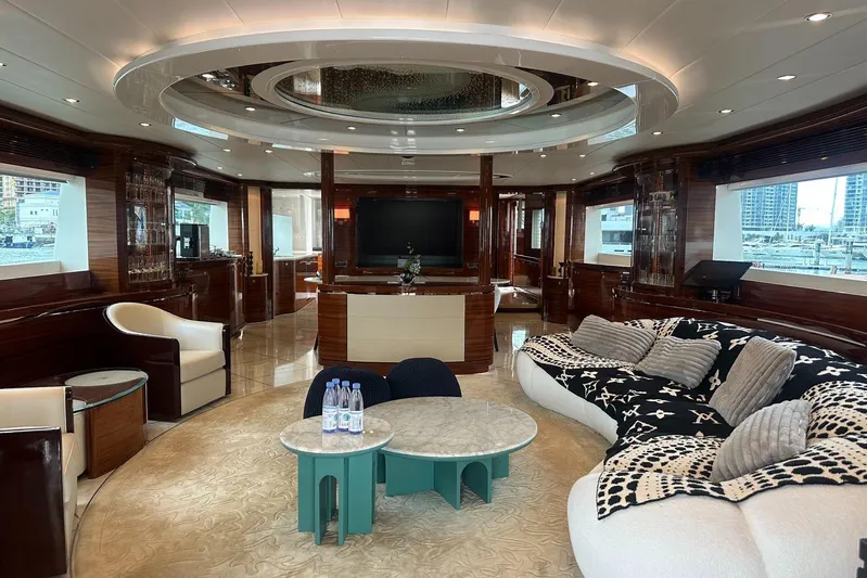  Yacht Photos Pics Luxurious yacht interior with elegant seating, modern decor, and large windows, Horizon 110, 2011 model.