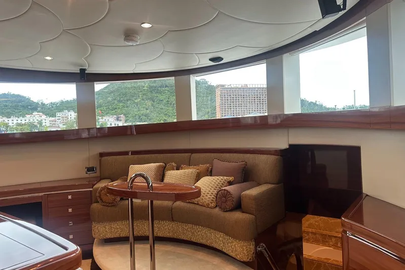  Yacht Photos Pics Luxurious interior of 2011 Horizon 110 yacht with plush seating and scenic windows.