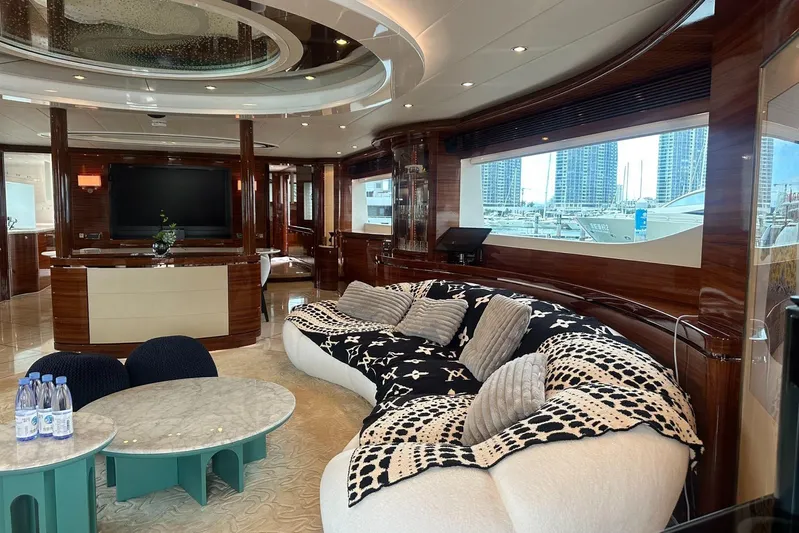 Yacht Photos Pics Luxurious Horizon 110 yacht interior with plush seating, modern decor, and marina view, 2011 model.