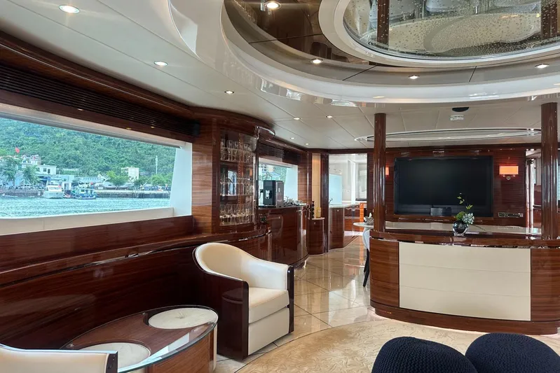  Yacht Photos Pics Luxurious interior of 2011 Horizon 110 yacht with elegant wood finishes and modern amenities.