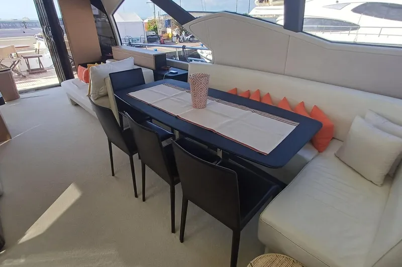  Yacht Photos Pics Luxurious interior of 2018 Azimut 77S yacht with elegant dining area and modern decor.