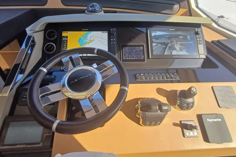  Yacht Photos Pics Cockpit of 2018 Azimut 77S yacht with advanced navigation controls and displays.