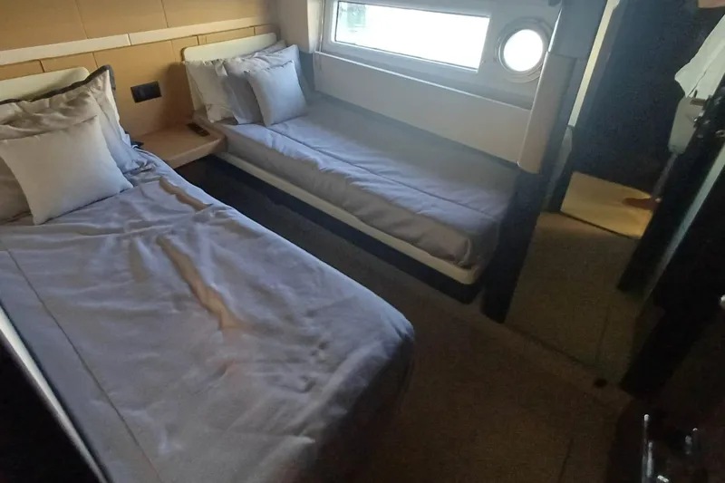  Yacht Photos Pics Interior of 2018 Azimut 77S yacht with twin beds and modern decor.