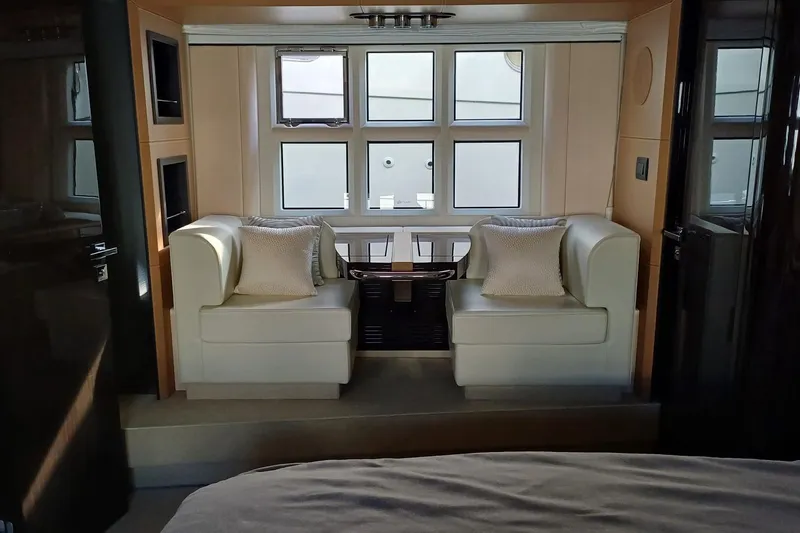  Yacht Photos Pics Luxurious interior of 2018 Azimut 77S yacht with elegant seating and large windows.