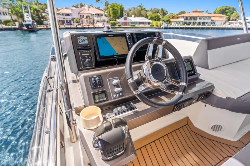  Yacht Photos Pics Cockpit of 2021 Galeon 500 Fly yacht with modern navigation equipment.