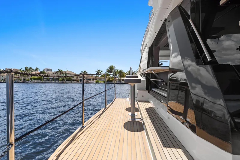  Yacht Photos Pics 2021 Galeon 500 Fly yacht deck with waterfront view, clear blue sky.