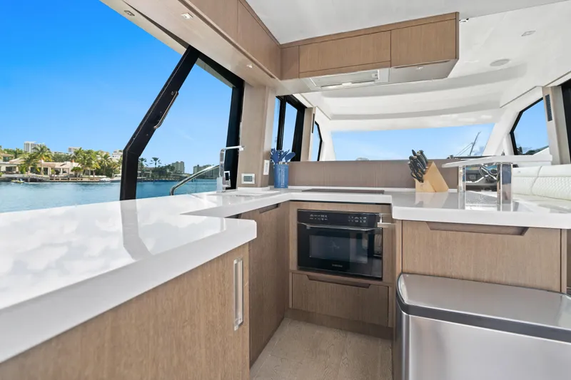  Yacht Photos Pics Modern kitchen interior on 2021 Galeon 500 Fly yacht with sleek countertops and appliances.
