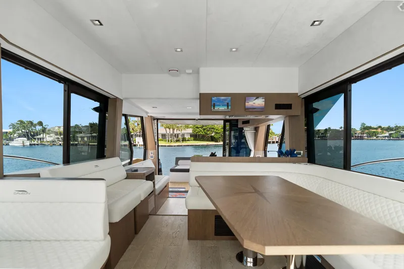  Yacht Photos Pics Interior of 2021 Galeon 500 Fly yacht with modern seating and scenic water views.