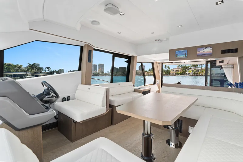  Yacht Photos Pics Luxurious interior of 2021 Galeon 500 Fly yacht with modern seating and scenic views.