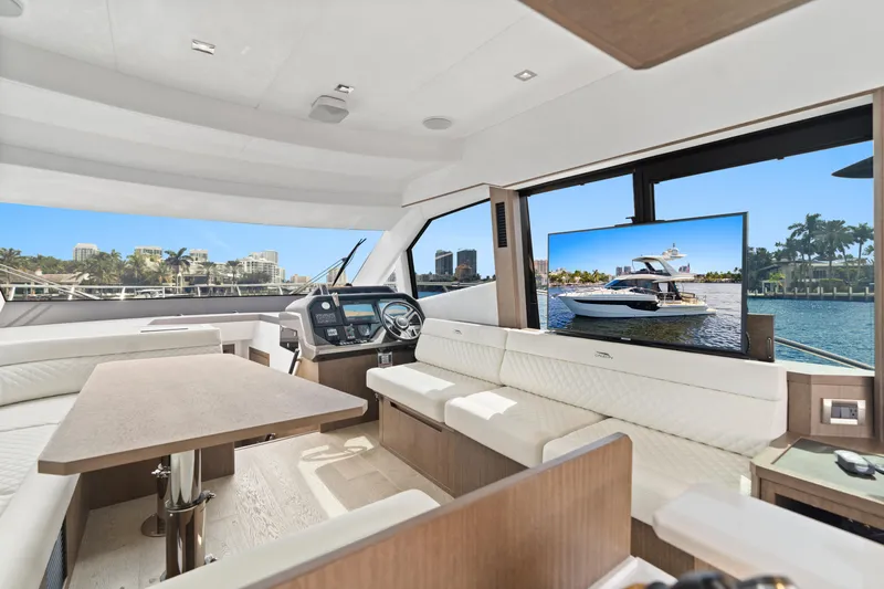  Yacht Photos Pics Luxurious interior of 2021 Galeon 500 Fly yacht with modern seating and scenic views.