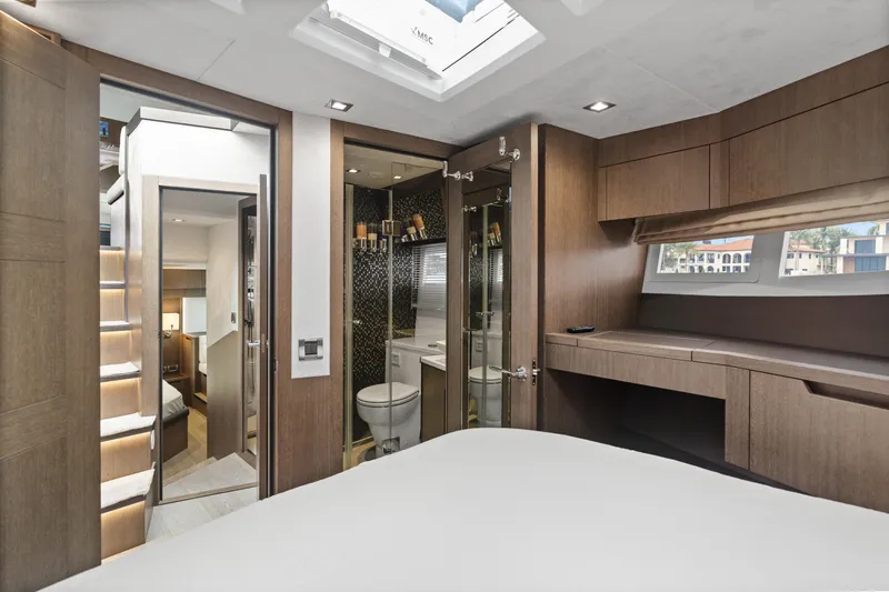 Yacht Photos Pics Luxurious interior of 2021 Galeon 500 Fly yacht with modern wood finishes and natural light.