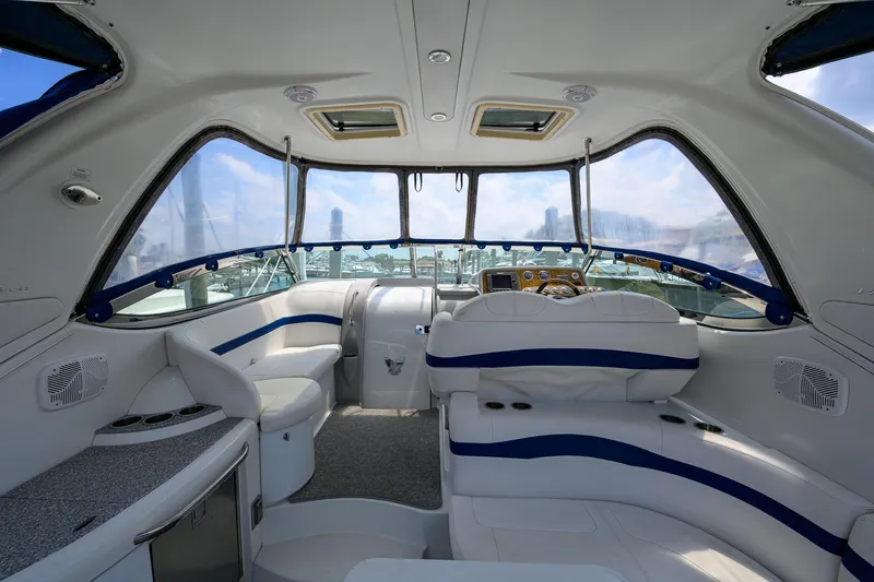 Sababa Yacht Photos Pics Interior of a 2007 Formula 37 PC yacht with luxurious seating and panoramic windows.