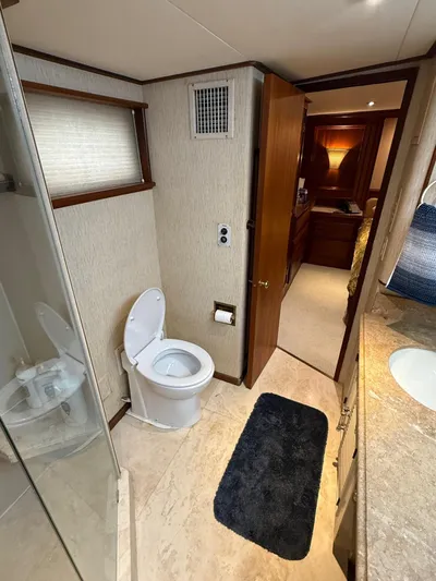 Miss Wendy Yacht Photos Pics Bathroom interior of a 1972 Burger 81 Raised Pilothouse yacht, featuring modern amenities.