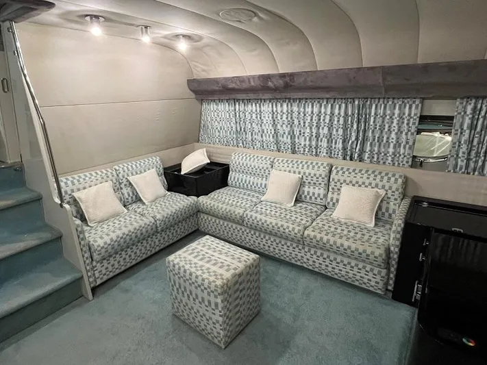  Yacht Photos Pics Luxurious interior of a 1989 Riva 60 Black Corsair yacht with patterned seating.