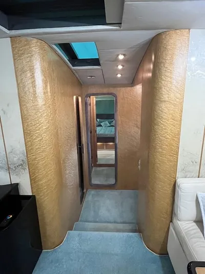  Yacht Photos Pics Interior hallway of a 1989 Riva 60 Black Corsair yacht with modern design elements.