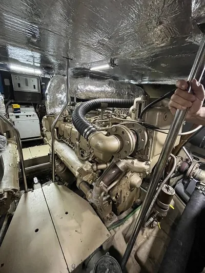  Yacht Photos Pics Engine room of 1989 Riva 60 Black Corsair yacht, showcasing mechanical components.