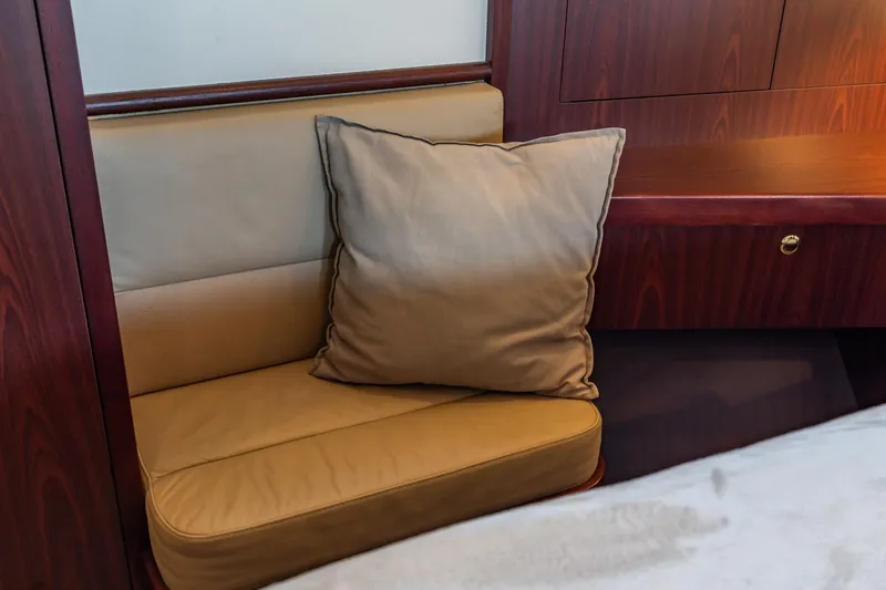 San Gottardo Yacht Photos Pics Cushioned seating area with pillow in 2009 Altena Expedition yacht interior.