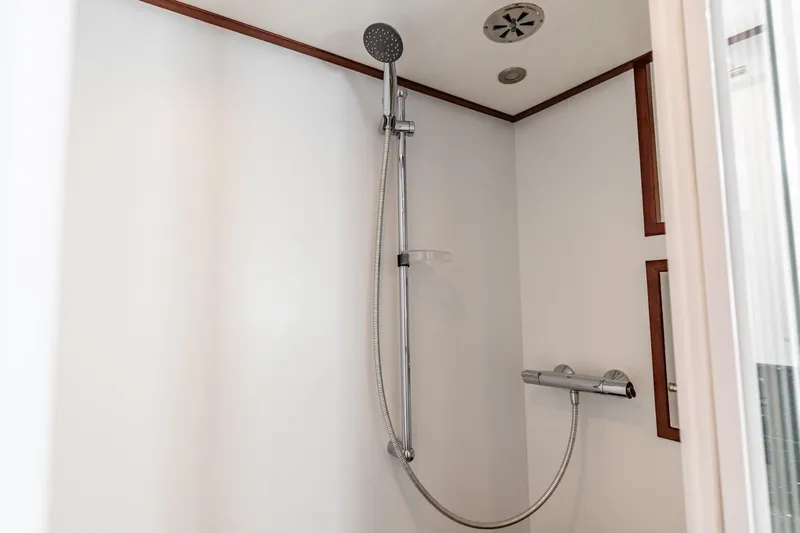 San Gottardo Yacht Photos Pics Modern shower in 2009 Altena Expedition yacht, featuring sleek chrome fixtures.