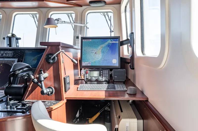 San Gottardo Yacht Photos Pics Bridge of 2009 Altena Expedition yacht with navigation equipment and map display.