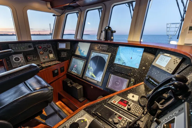 San Gottardo Yacht Photos Pics Control room of 2009 Altena Expedition yacht with navigation equipment and ocean view.