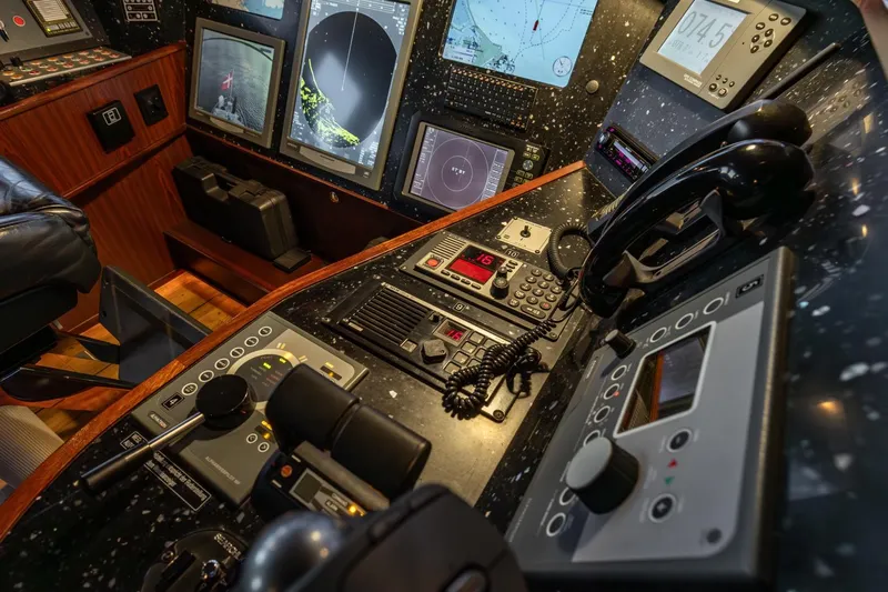 San Gottardo Yacht Photos Pics Control panel of a 2009 Altena Expedition yacht with navigation and communication equipment.