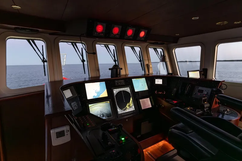 San Gottardo Yacht Photos Pics Bridge of 2009 Altena Expedition yacht with navigation equipment and ocean view.