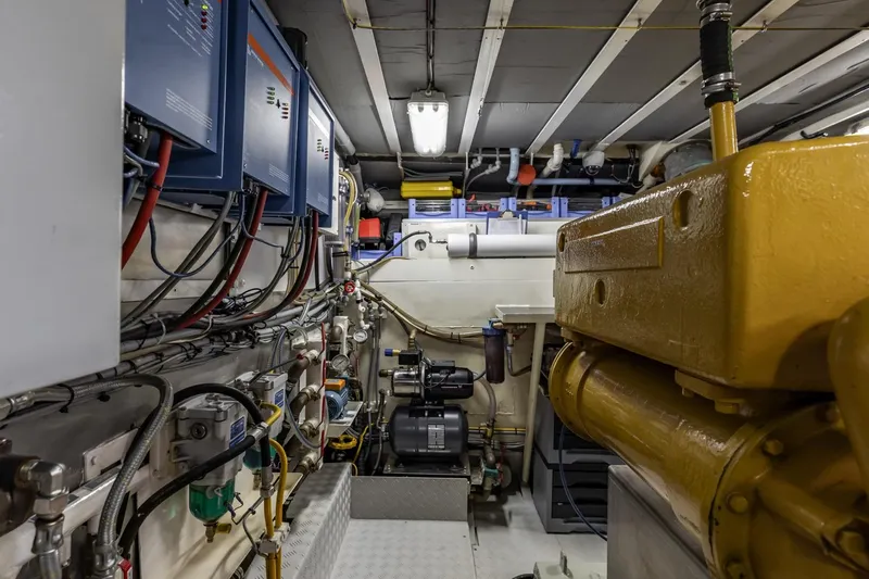 San Gottardo Yacht Photos Pics Engine room of 2009 Altena Expedition yacht with machinery and control panels.