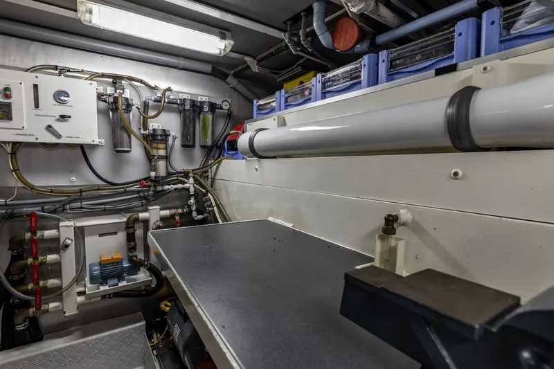 San Gottardo Yacht Photos Pics Engine room of 2009 Altena Expedition yacht, featuring complex piping and control systems.