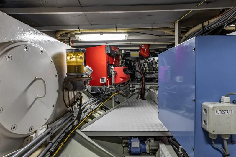 San Gottardo Yacht Photos Pics Engine room of 2009 Altena Expedition yacht, featuring complex machinery and wiring.