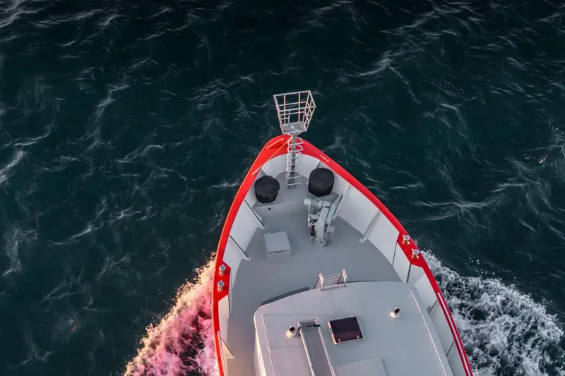 San Gottardo Yacht Photos Pics Aerial view of 2009 Altena Expedition boat navigating through ocean waters.