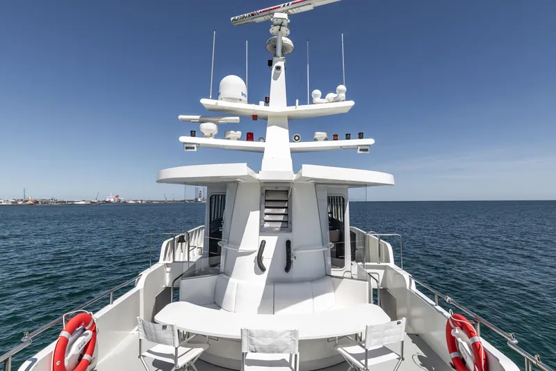 San Gottardo Yacht Photos Pics 2009 Altena Expedition yacht on open sea with clear blue sky.