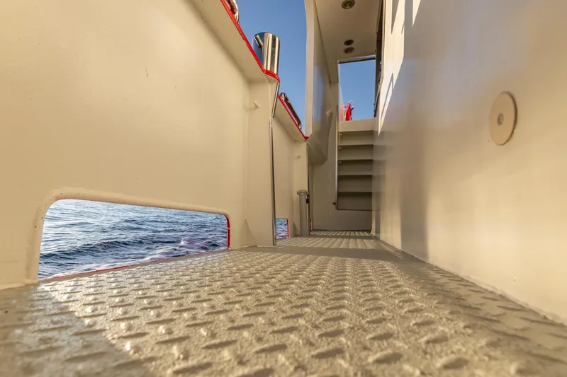 San Gottardo Yacht Photos Pics Altena Expedition 2009 yacht deck with ocean view and stairs.